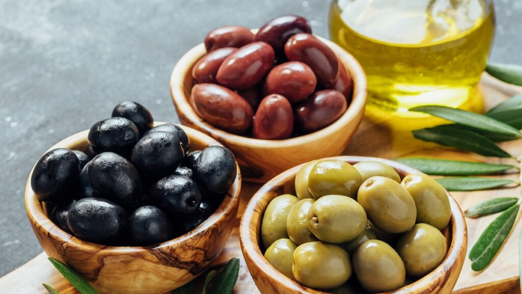 Set,Of,Green,,Black,And,Red,Or,Pink,Olives,And